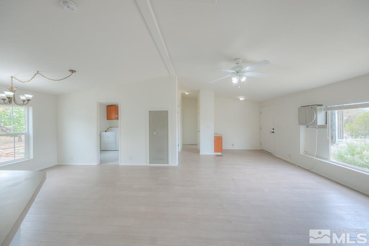 15186 Pinion Drive Reno, NV 89521 - Photo 6 of 20 a view of an empty room with a window