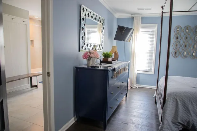 a view of hallway with furniture and a window