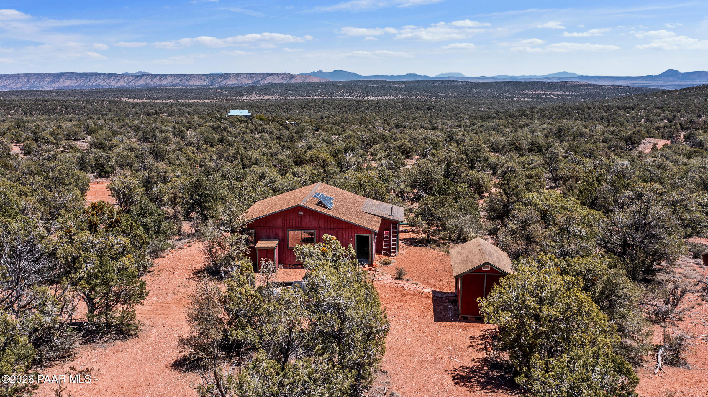 33749 West Whiskey River Road, Unit 21 Seligman, AZ 86337 - Photo 5 of 41 an aerial view of a house with a yard