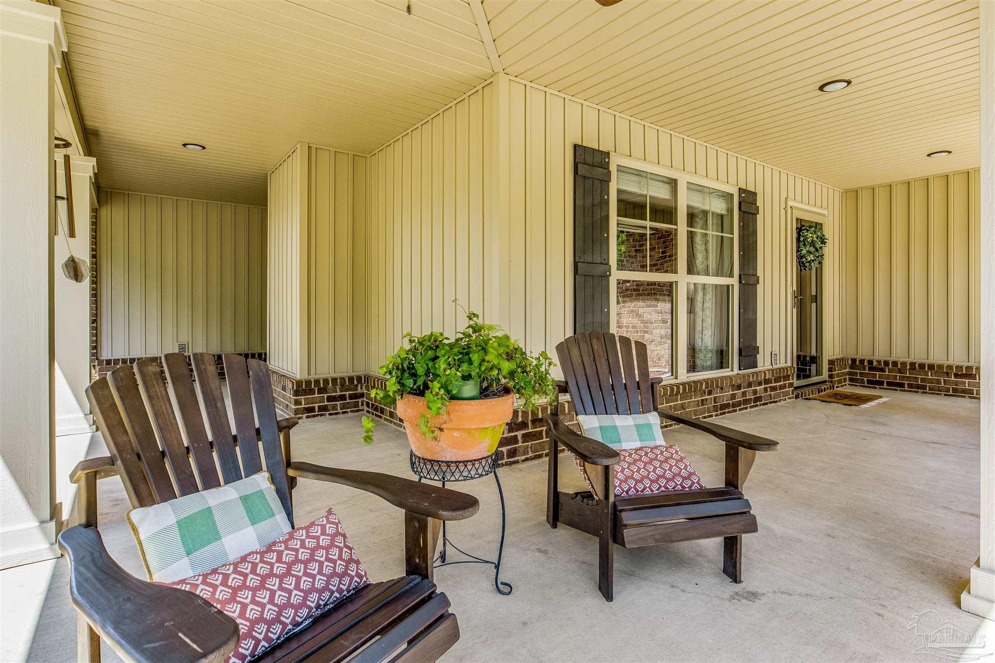 7223 Martin Road Milton, FL 32570 - Photo 11 of 27 a outdoor living space with furniture