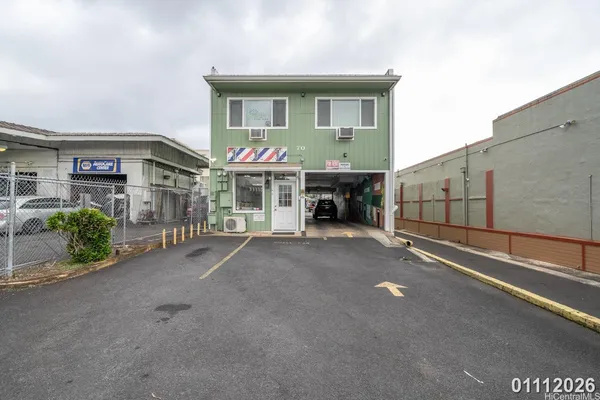 a front view of a house with a garage