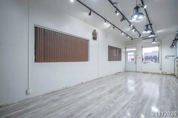 a view of a kitchen with appliances
