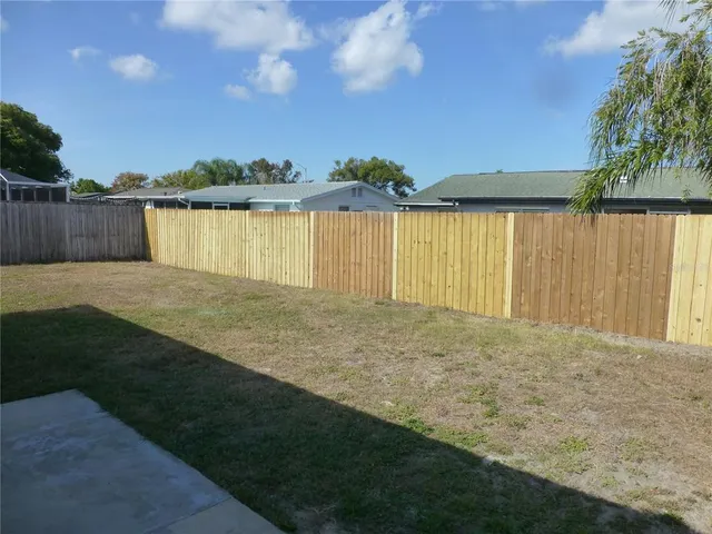 a view of a lake with a big yard