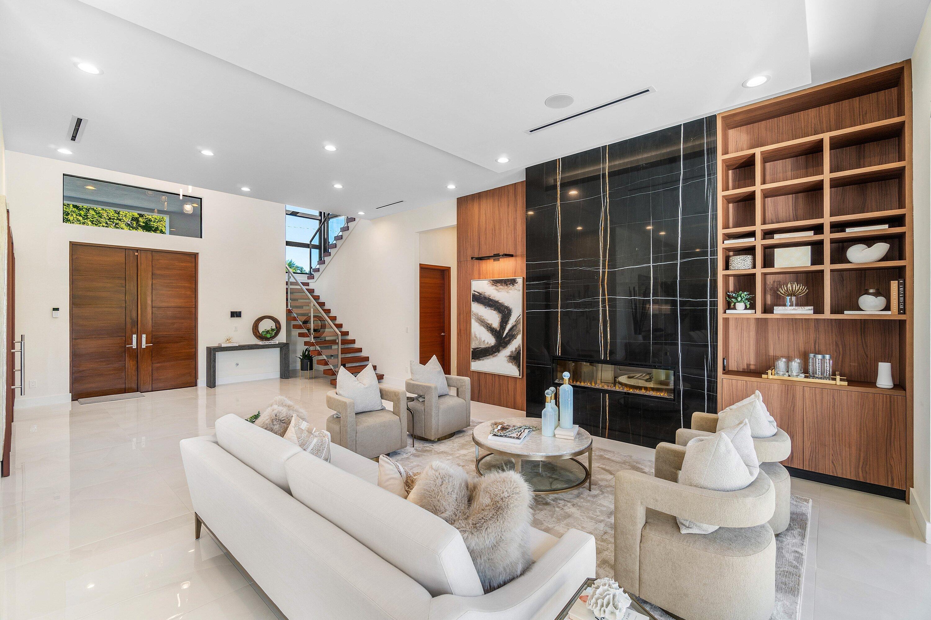 450 Northeast 10th Street Boca Raton, FL 33432 - Photo 17 of 119 a living room with furniture and a floor to ceiling window