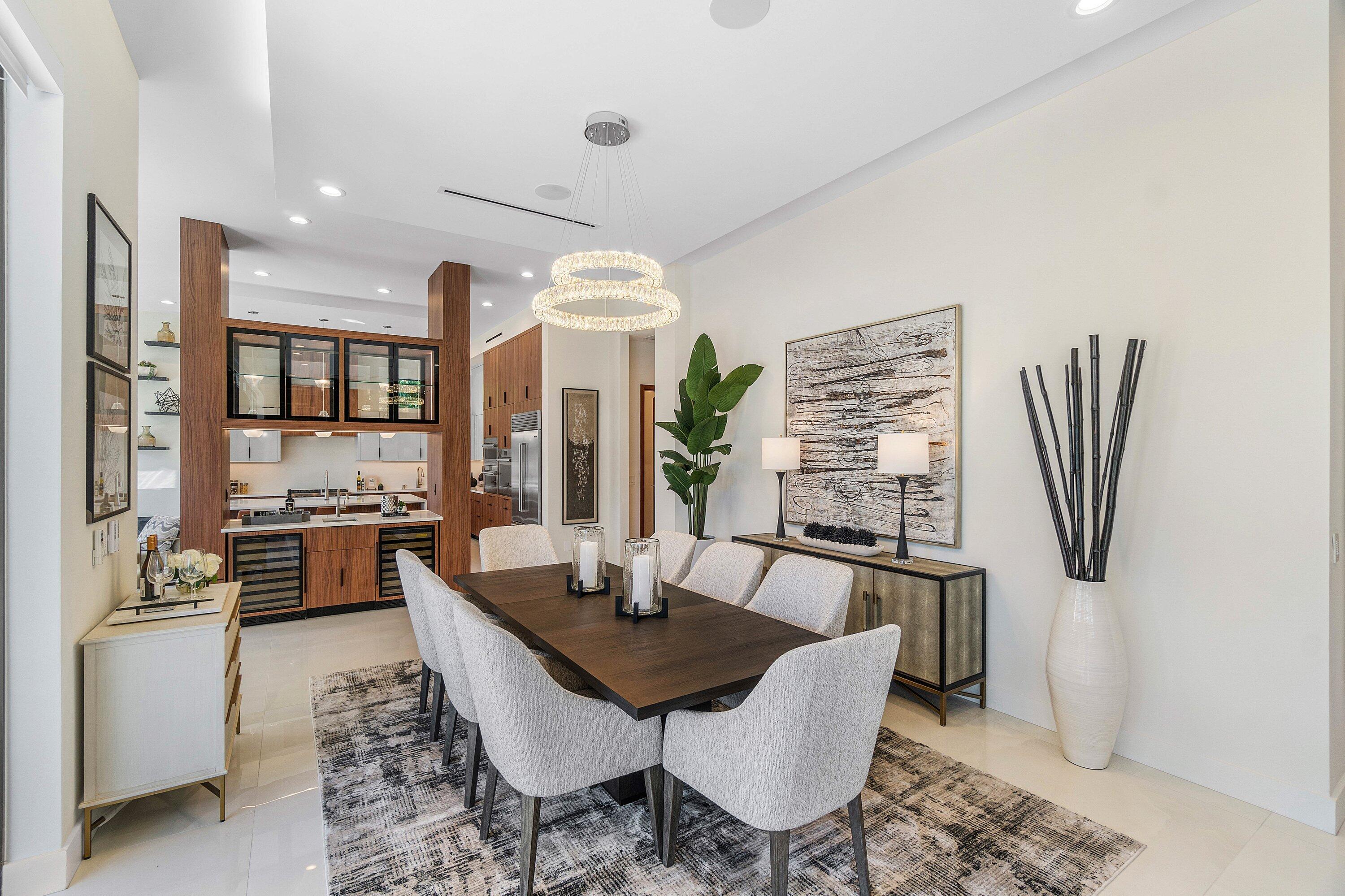 450 Northeast 10th Street Boca Raton, FL 33432 - Photo 68 of 119 a dining room with furniture and a floor to ceiling window