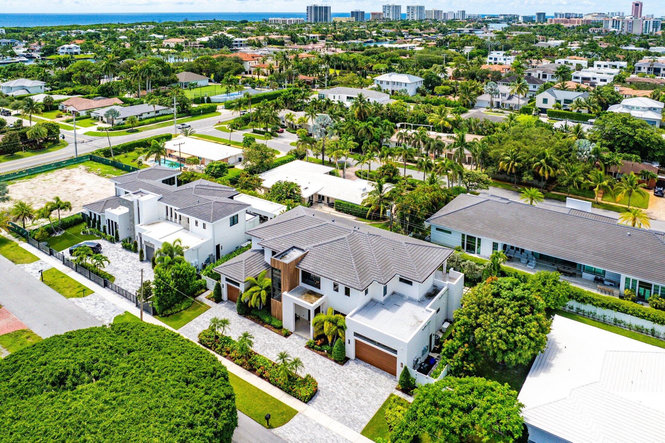 450 Northeast 10th Street Boca Raton, FL 33432 - Photo 8 of 119 an aerial view of residential houses with outdoor space and street view