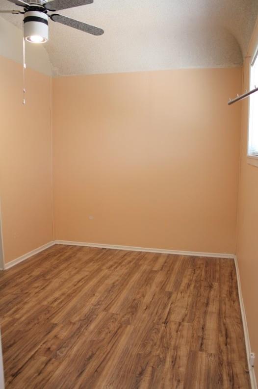 331 North 6th Street Fowler, CA 93625 - Photo 13 of 31 a view of an empty room with wooden floor