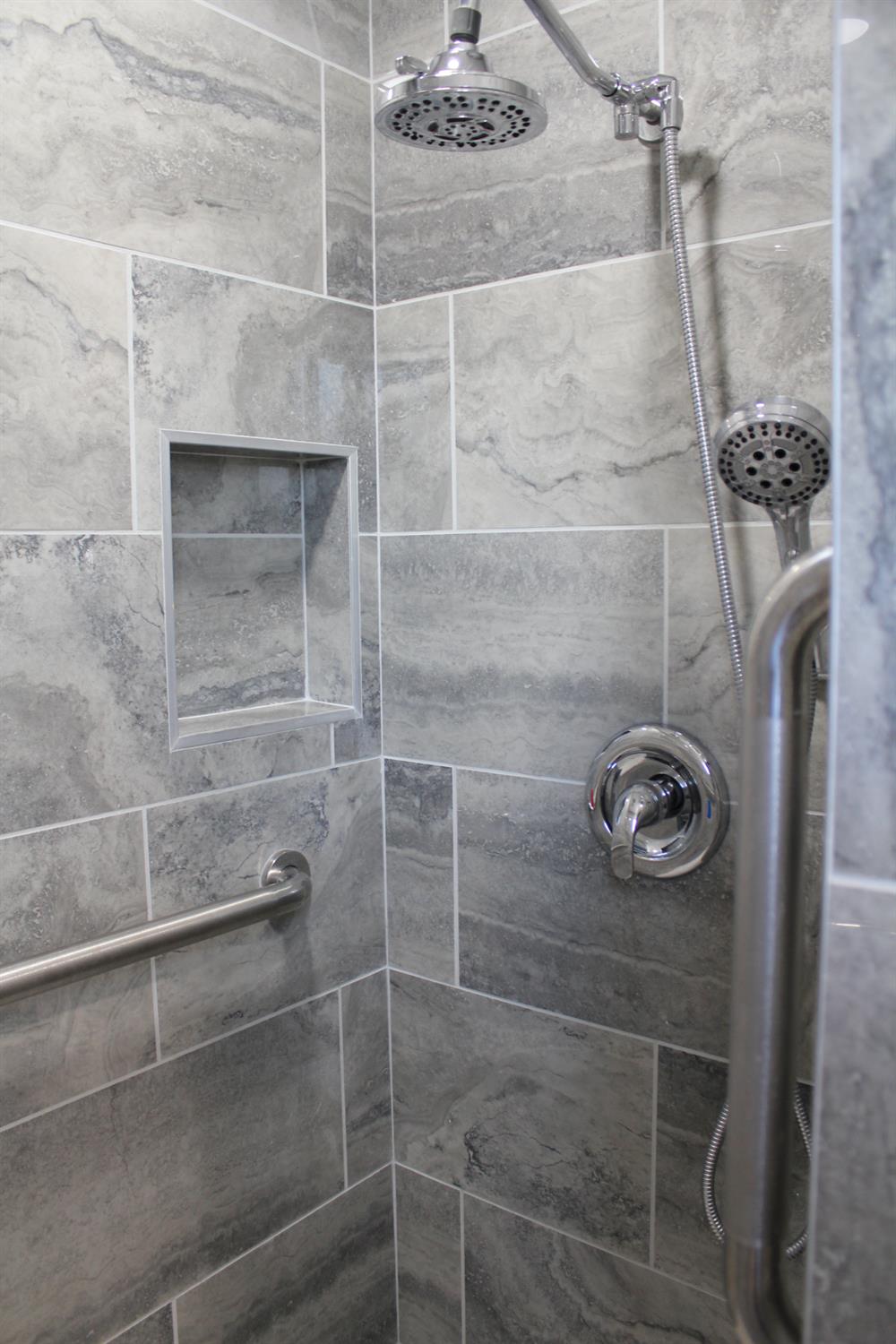 331 North 6th Street Fowler, CA 93625 - Photo 21 of 31 a bathroom with a shower