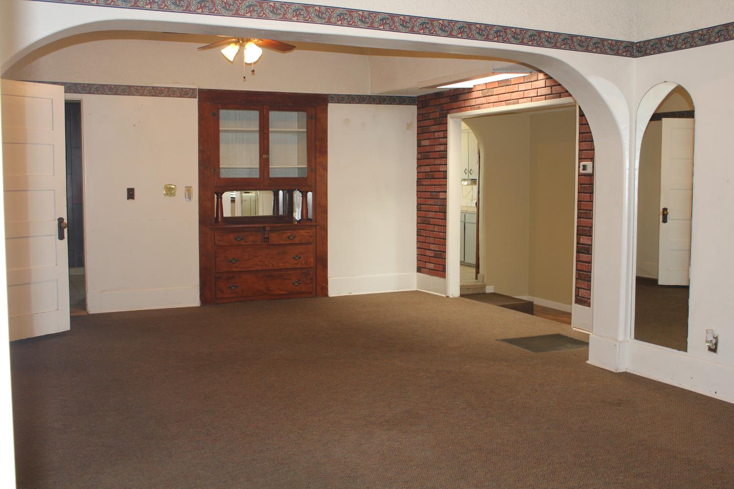 331 North 6th Street Fowler, CA 93625 - Photo 4 of 31 a view of a hallway with front door