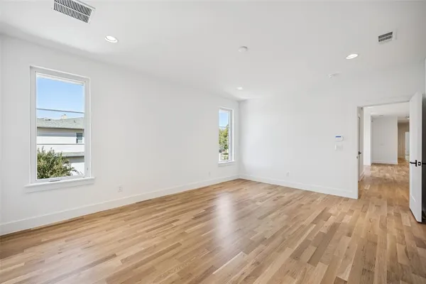 a white bath tub sitting in a bathroom
