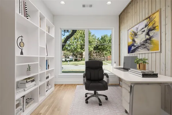 a workspace with furniture and a window
