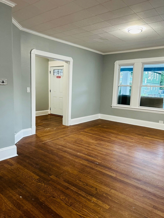 44 Virginia Street, Unit 1 Springfield, MA 01108 - Photo 2 of 13 a view of an empty room with wooden floor