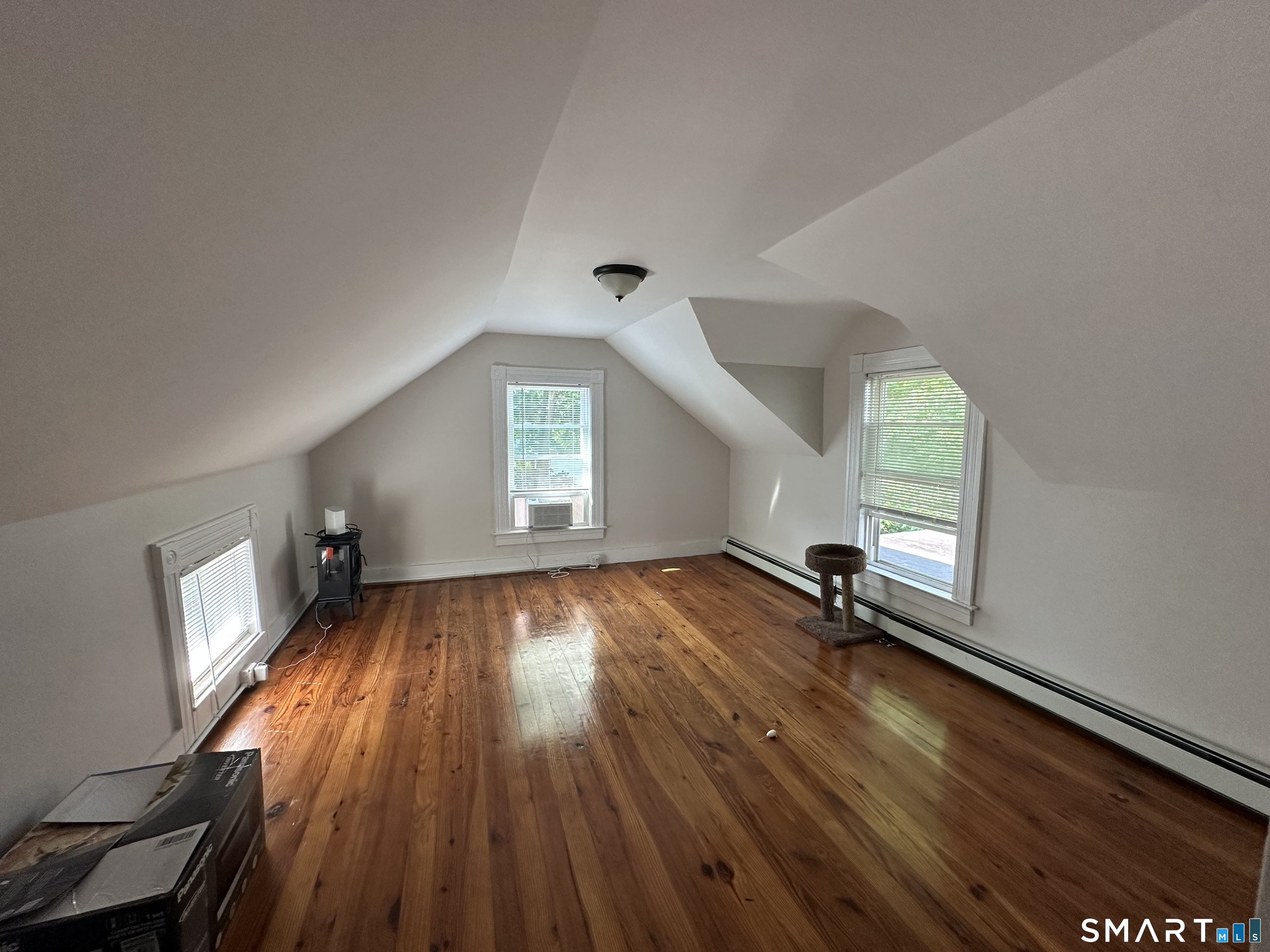 22 North Main Street, Unit 2 East Hampton, CT 06424 - Photo 9 of 17 Bright living room with hardwood floors.