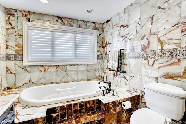 a bathroom with a sink and a bathtub