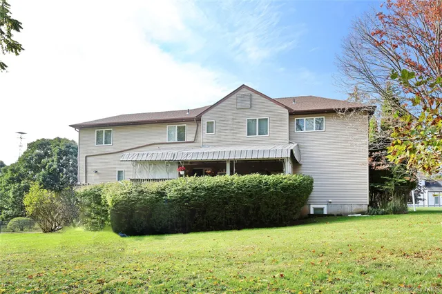 a view of a house with a garden