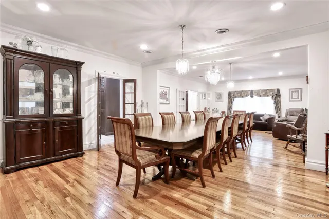 a large kitchen with a table and chairs