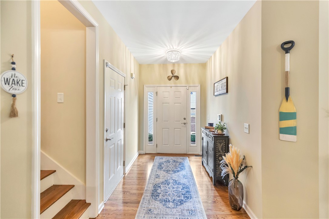 101 Riviera Circle Anderson, SC 29621 - Photo 5 of 35 The foyer offers a warm welcome with rich hardwood flooring and a stylish rug.