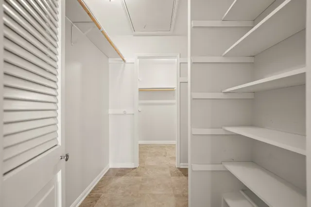 a view of an empty walk in closet
