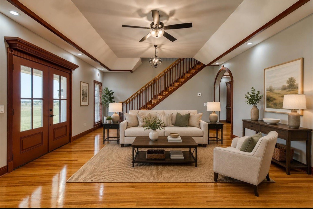 315 Blue And Gray Park Road Elkton, KY 42220 - Photo 65 of 66 a living room with furniture ceiling fan and a rug