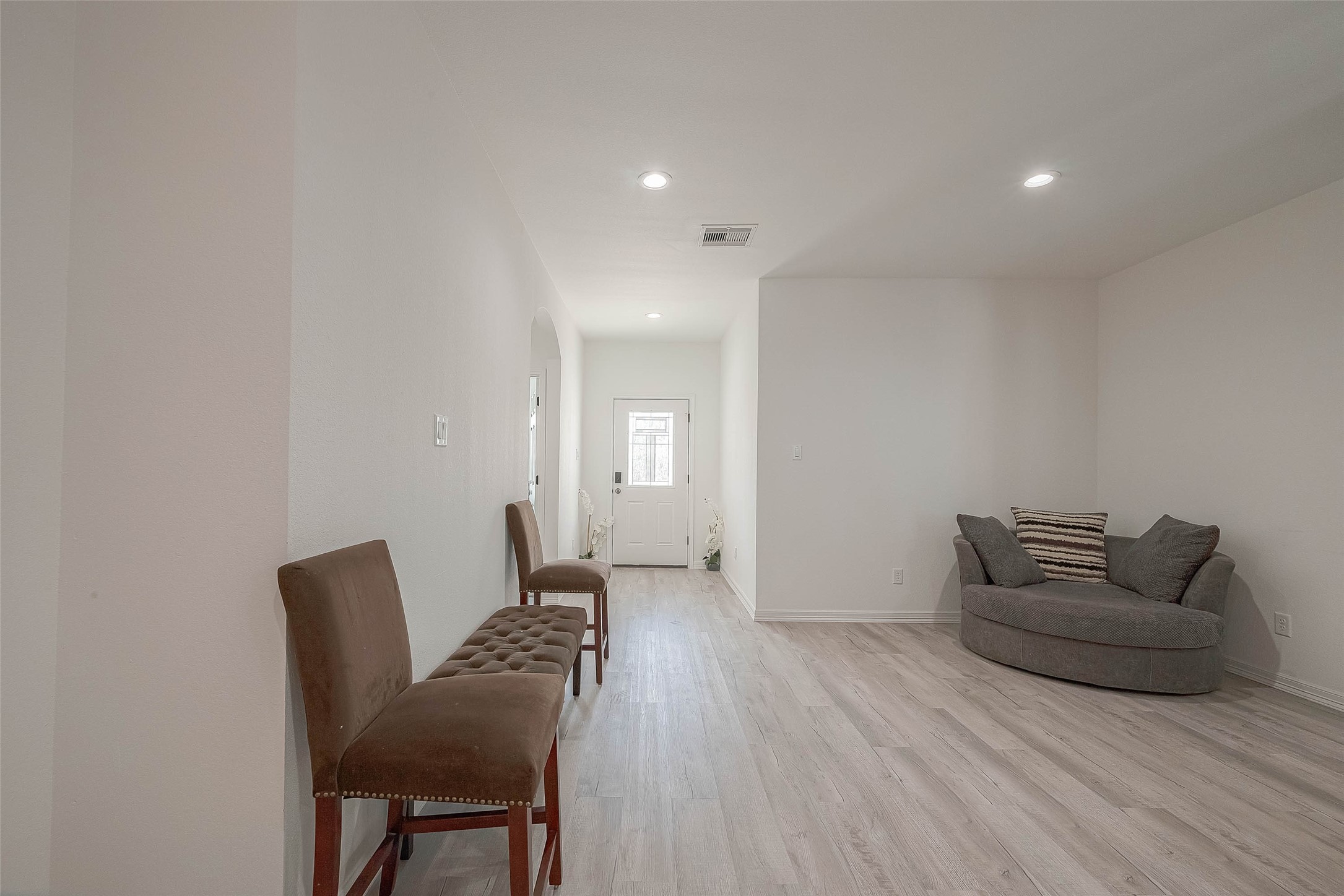 4633 Larkspur Street Houston, TX 77051 - Photo 27 of 48 a living room with furniture and a couch