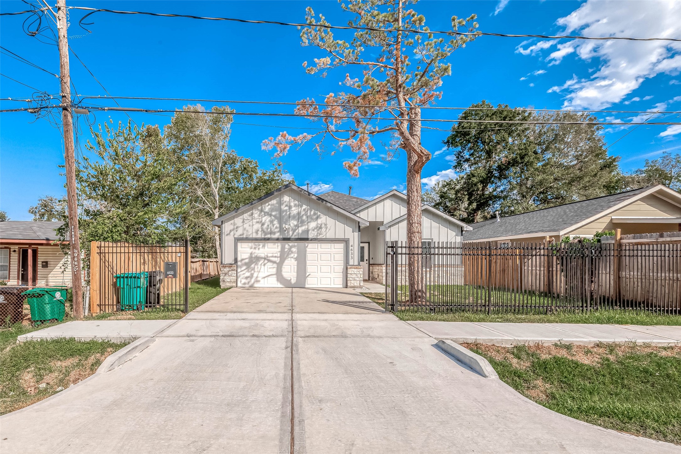 4633 Larkspur Street Houston, TX 77051 - Photo 3 of 48 a front view of a house with a yard