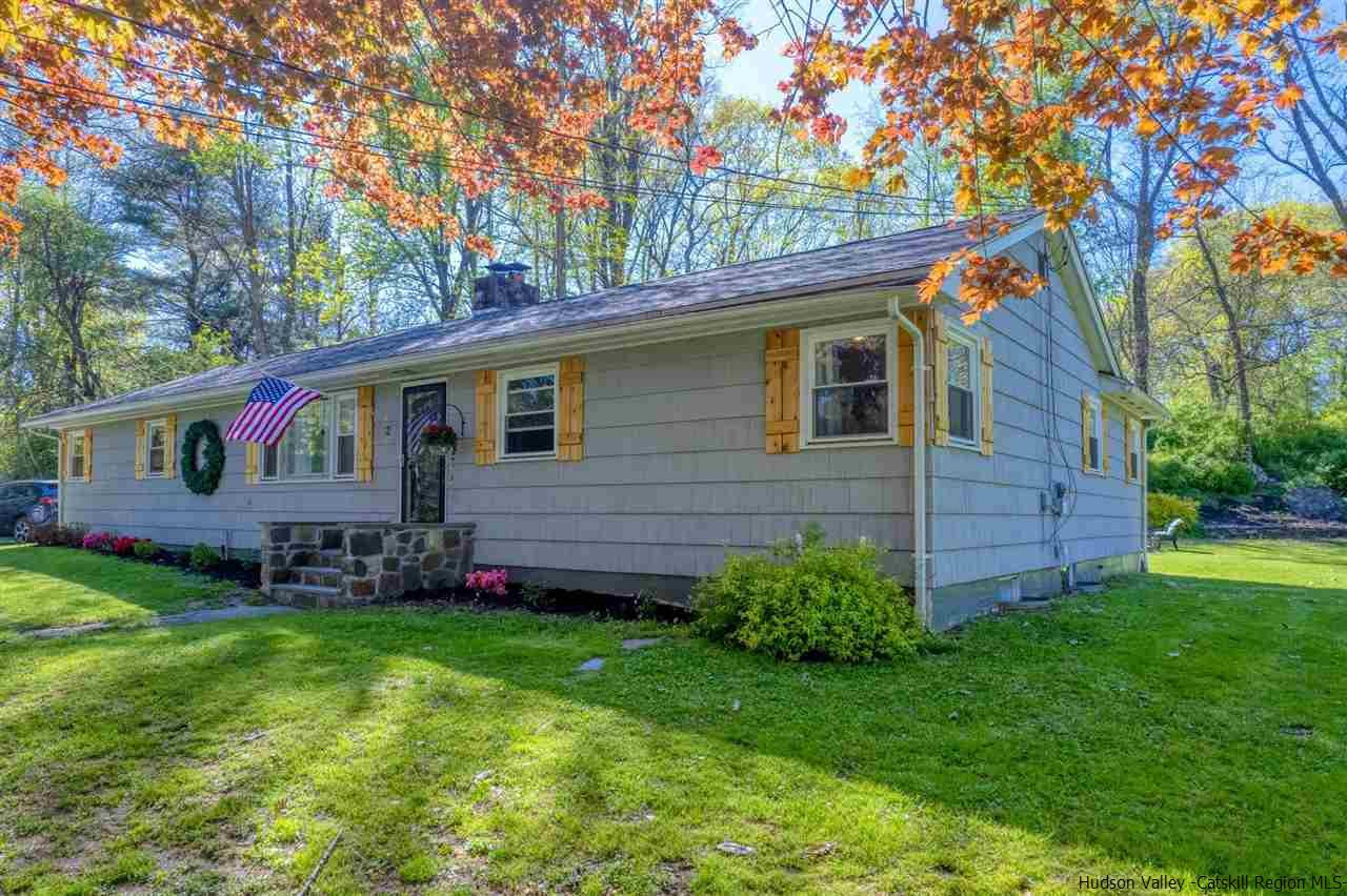 84 Benner Road Red Hook, NY 12571 - Photo 1 of 33 a front view of house with yard and green space