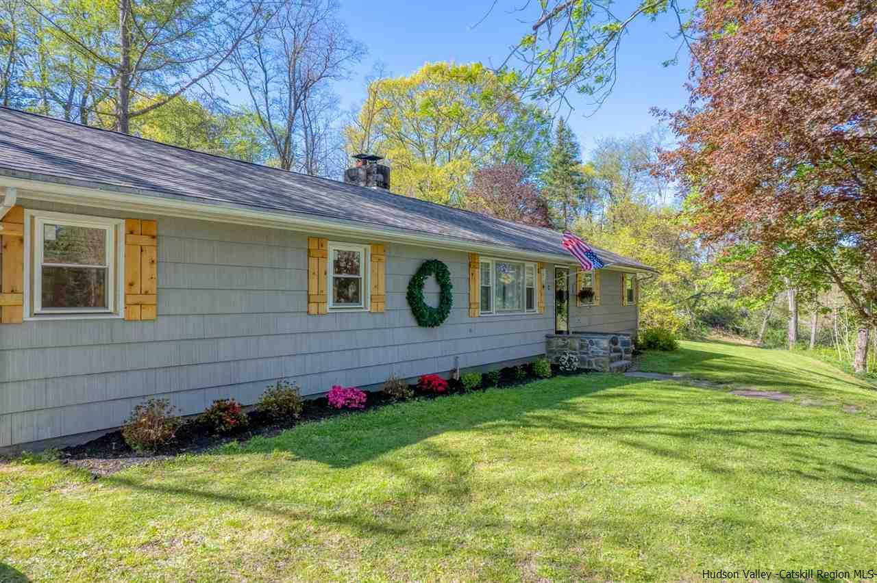 84 Benner Road Red Hook, NY 12571 - Photo 3 of 33 a view of a house with a backyard