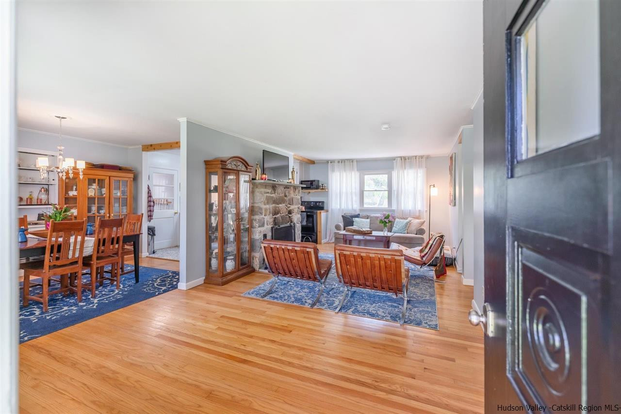 84 Benner Road Red Hook, NY 12571 - Photo 4 of 33 a bedroom with furniture and wooden floor