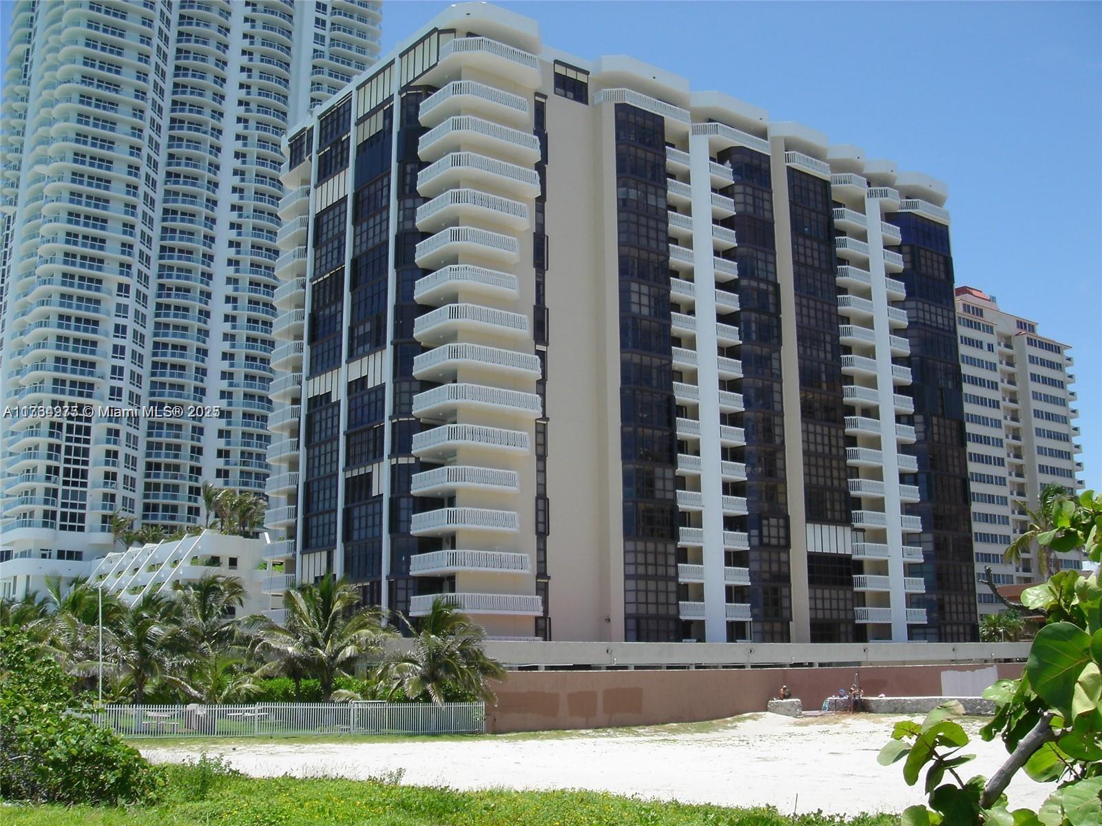 6423 Collins Avenue, Unit 901 Miami Beach, FL 33141 - Photo 1 of 17 a front view of a building