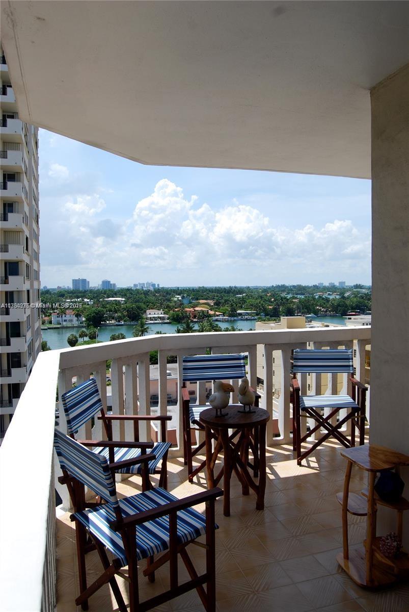 6423 Collins Avenue, Unit 901 Miami Beach, FL 33141 - Photo 4 of 17 a view of a balcony with chairs