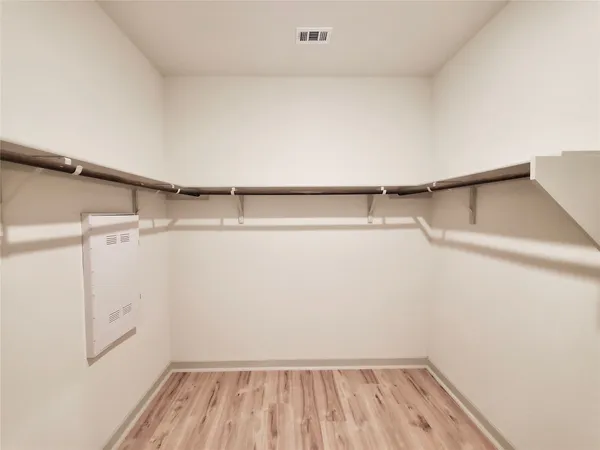 a view of a room with racks on the wall