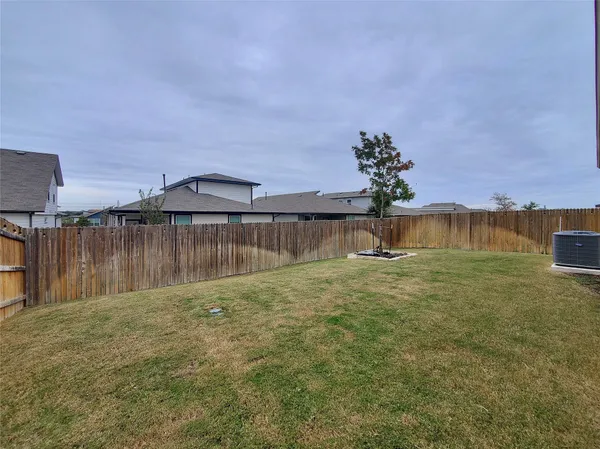 a view of a lake with a big yard