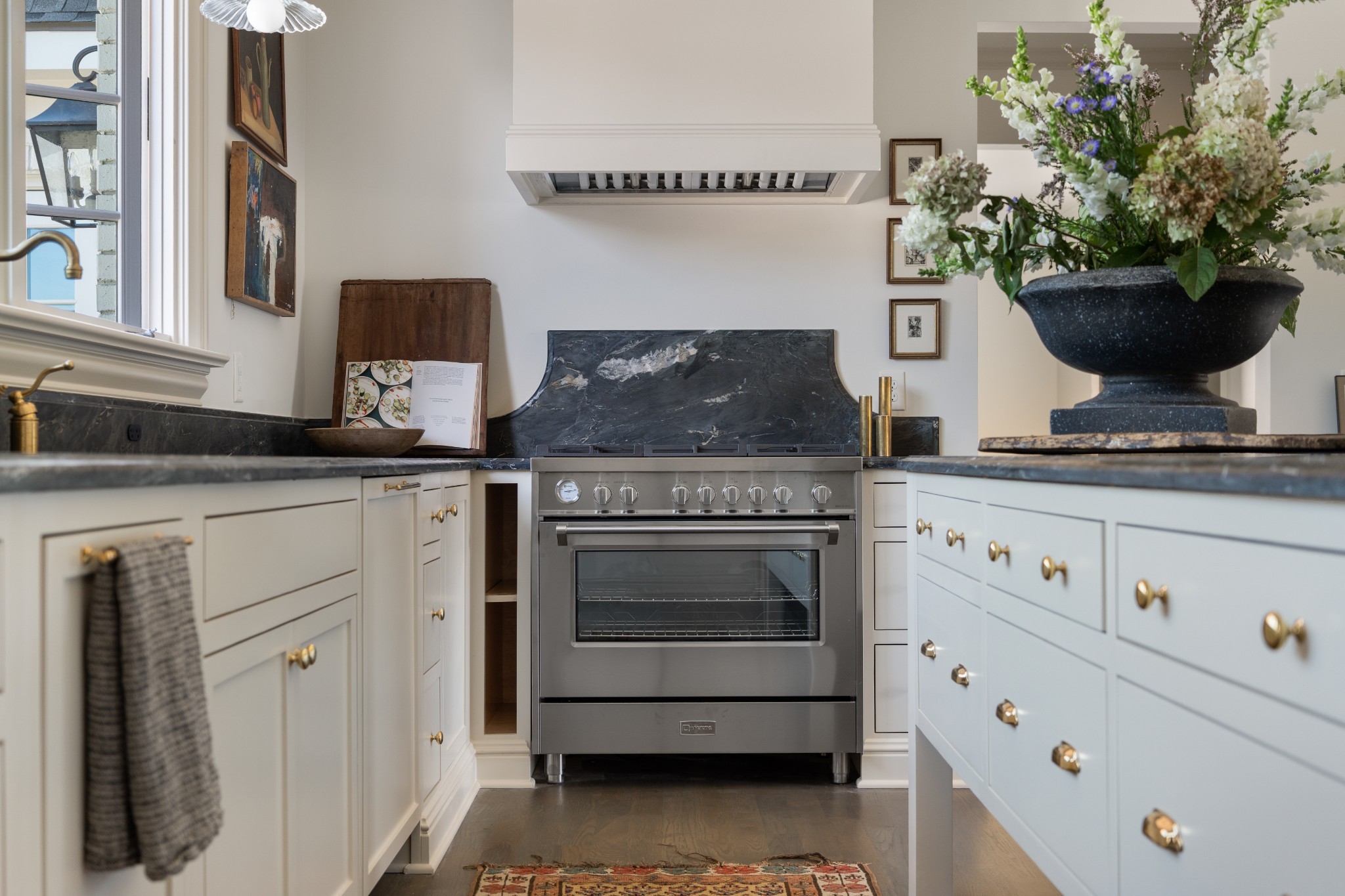 896 Sneed Road West Franklin, TN 37069 - Photo 13 of 55 a kitchen with a stove and white cabinets