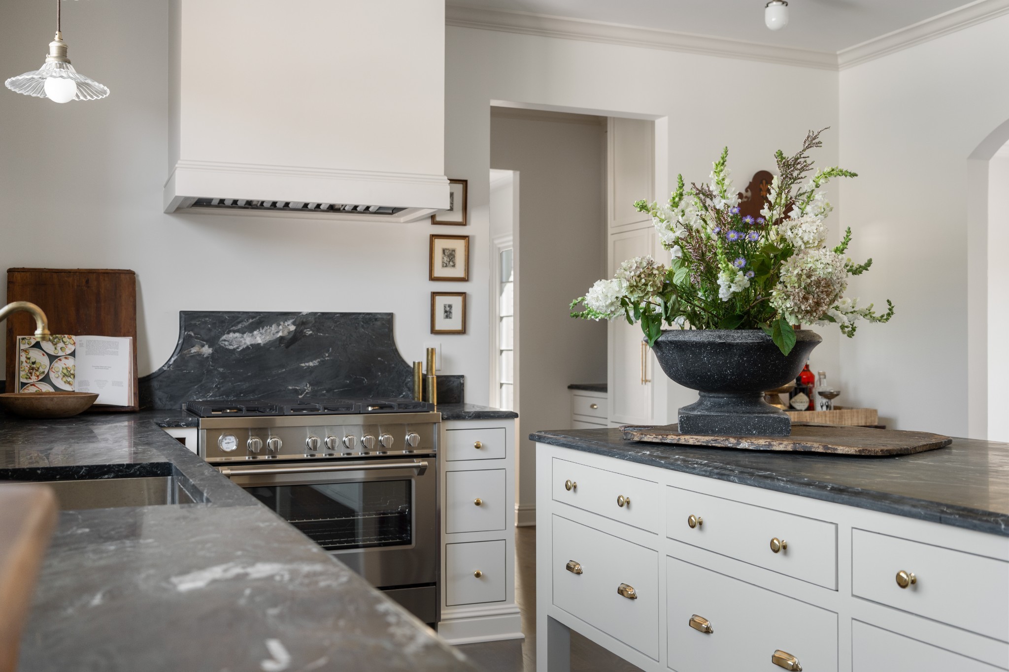 896 Sneed Road West Franklin, TN 37069 - Photo 15 of 55 a kitchen with stainless steel appliances kitchen island a stove and a potted plant
