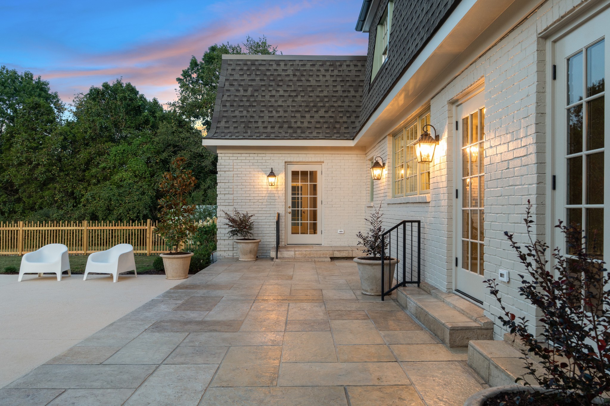 896 Sneed Road West Franklin, TN 37069 - Photo 47 of 55 a view of a patio with a table and chairs and potted plants