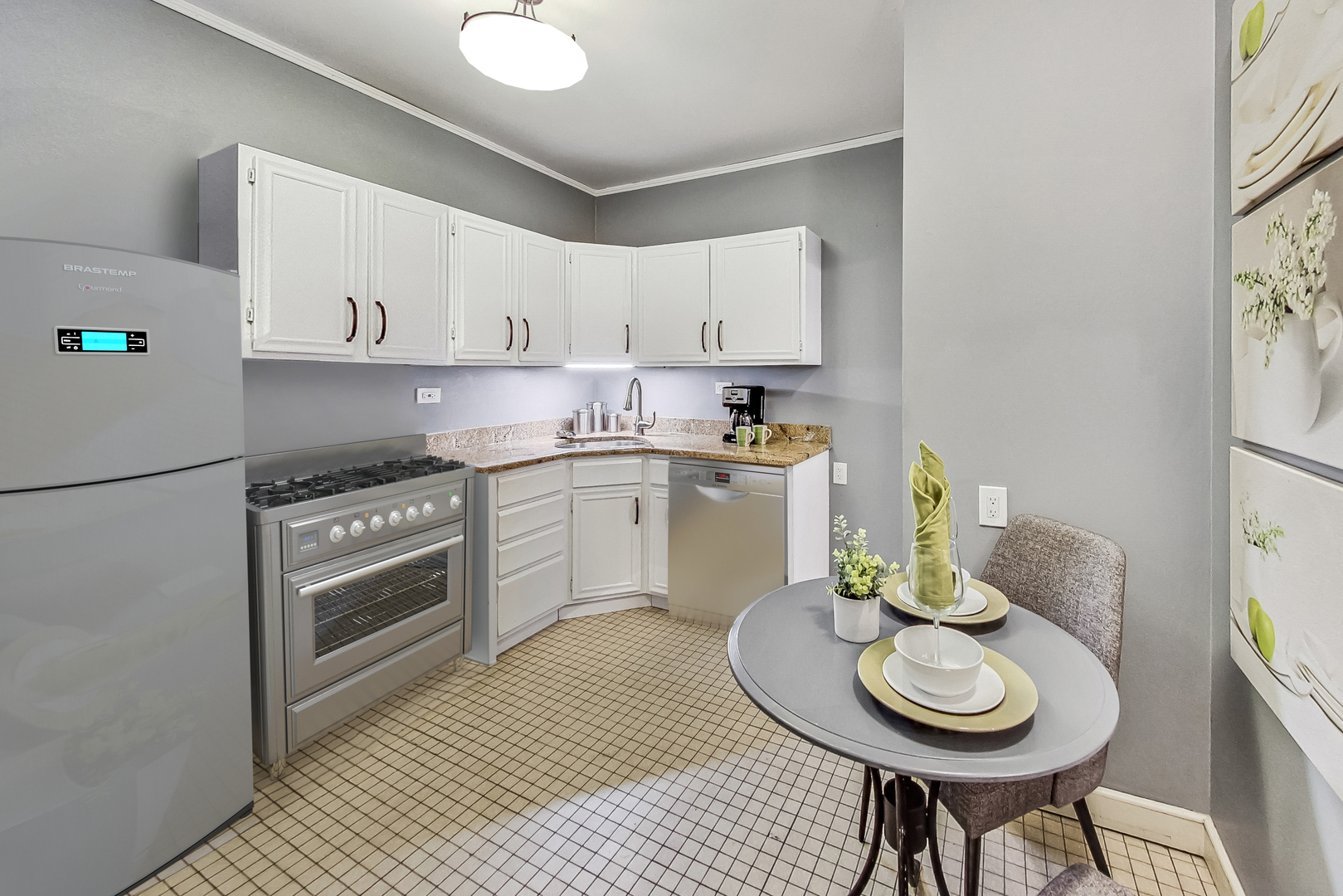 545 West Brompton Avenue, Unit 2S Chicago, IL 60657 - Photo 13 of 29 a kitchen with a sink cabinets and stove top oven