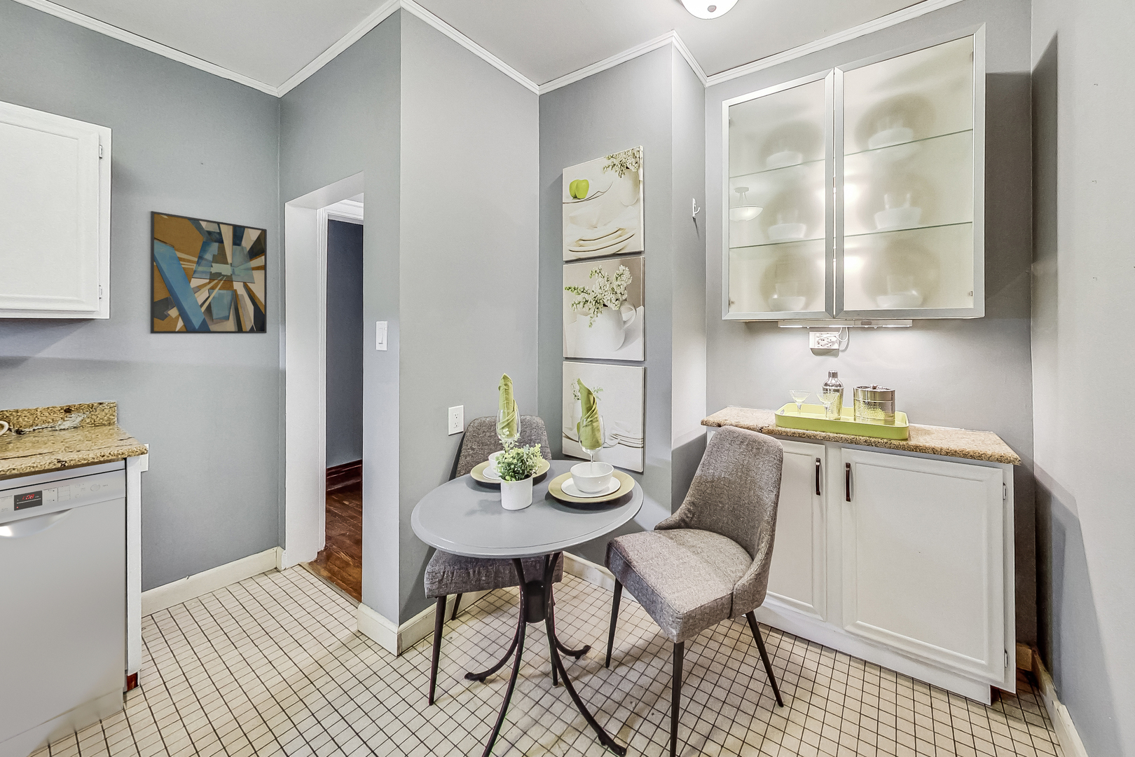 545 West Brompton Avenue, Unit 2S Chicago, IL 60657 - Photo 14 of 29 a kitchen with a table and chairs in it