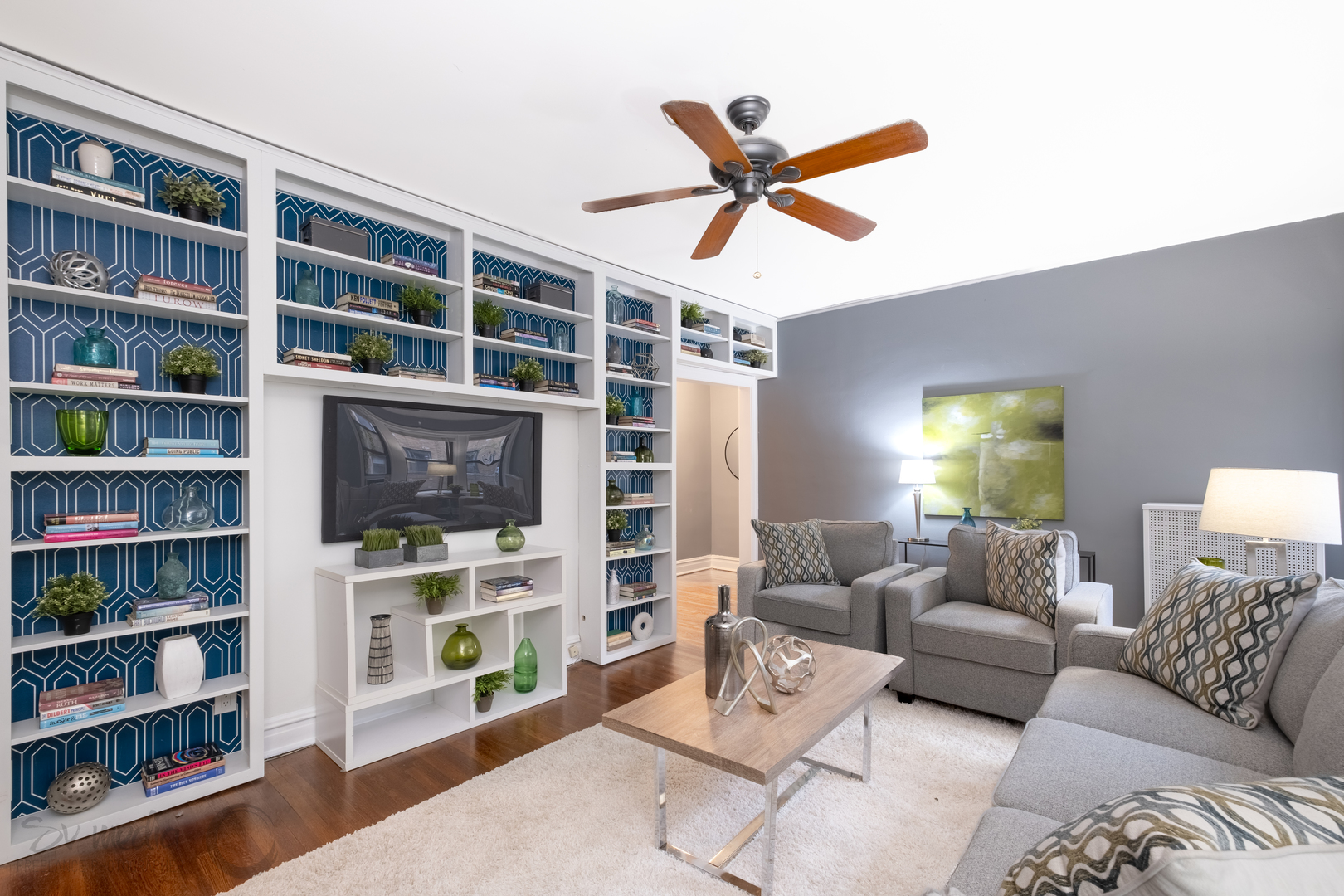 545 West Brompton Avenue, Unit 2S Chicago, IL 60657 - Photo 10 of 29 a living room with furniture and a flat screen tv