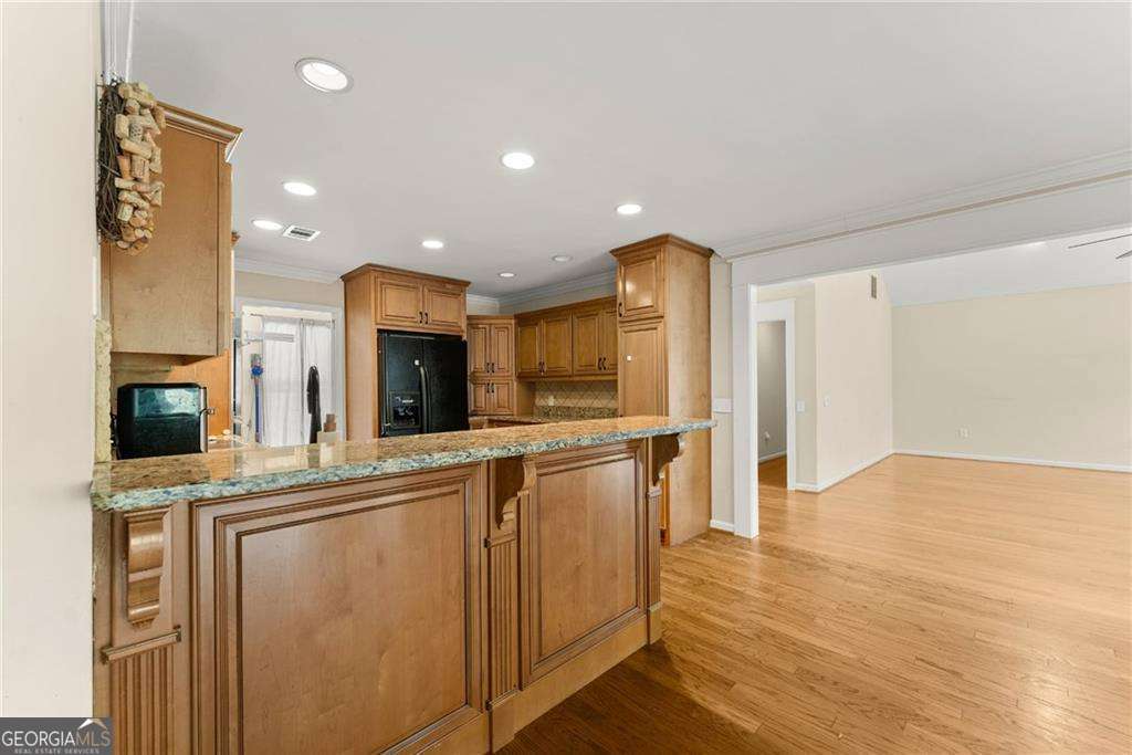 749 Hubert Pittman Road, Unit TRACT 2 Pendergrass, GA 30567 - Photo 14 of 61 a kitchen with stainless steel appliances granite countertop a refrigerator and a stove top oven