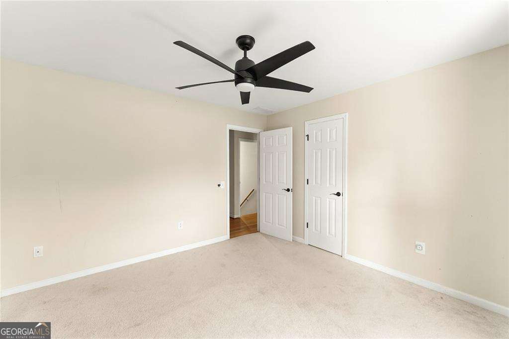 749 Hubert Pittman Road, Unit TRACT 2 Pendergrass, GA 30567 - Photo 24 of 61 a view of empty room with a ceiling fan