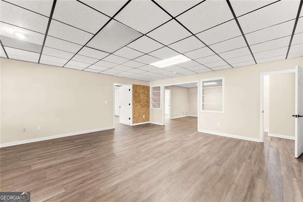 749 Hubert Pittman Road, Unit TRACT 2 Pendergrass, GA 30567 - Photo 31 of 61 a view of empty room with wooden floor and natural light