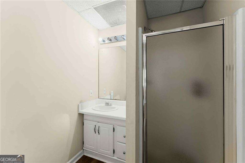 749 Hubert Pittman Road, Unit TRACT 2 Pendergrass, GA 30567 - Photo 42 of 61 a bathroom with a sink toilet and vanity
