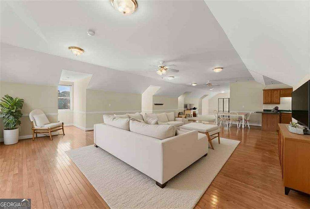 749 Hubert Pittman Road, Unit TRACT 2 Pendergrass, GA 30567 - Photo 46 of 61 a living room with furniture and a large window