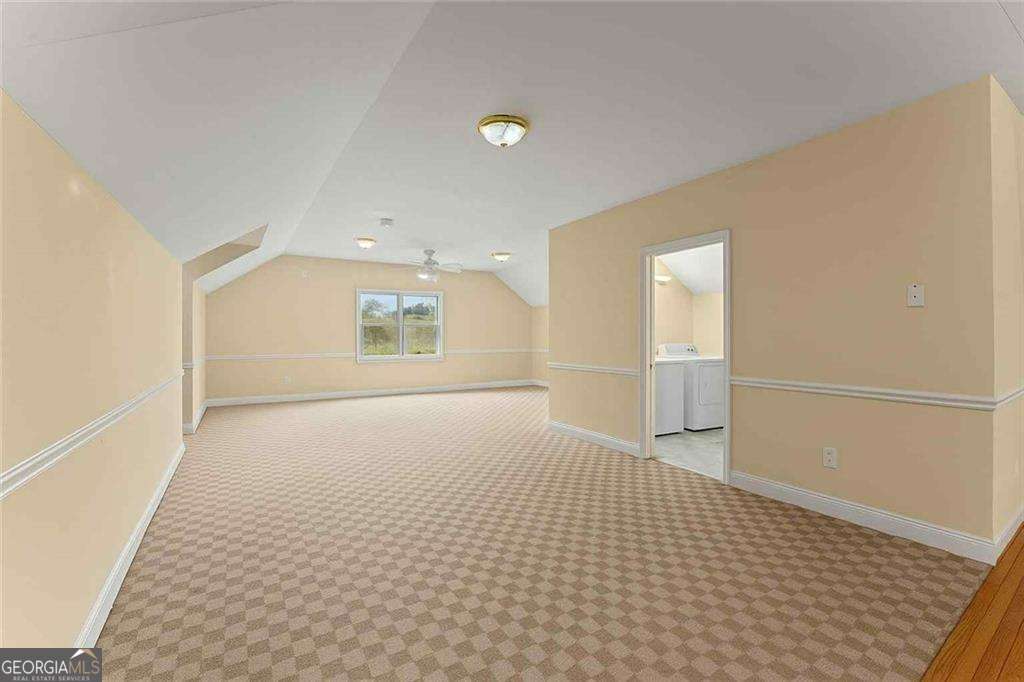 749 Hubert Pittman Road, Unit TRACT 2 Pendergrass, GA 30567 - Photo 48 of 61 a view of an empty room and a window