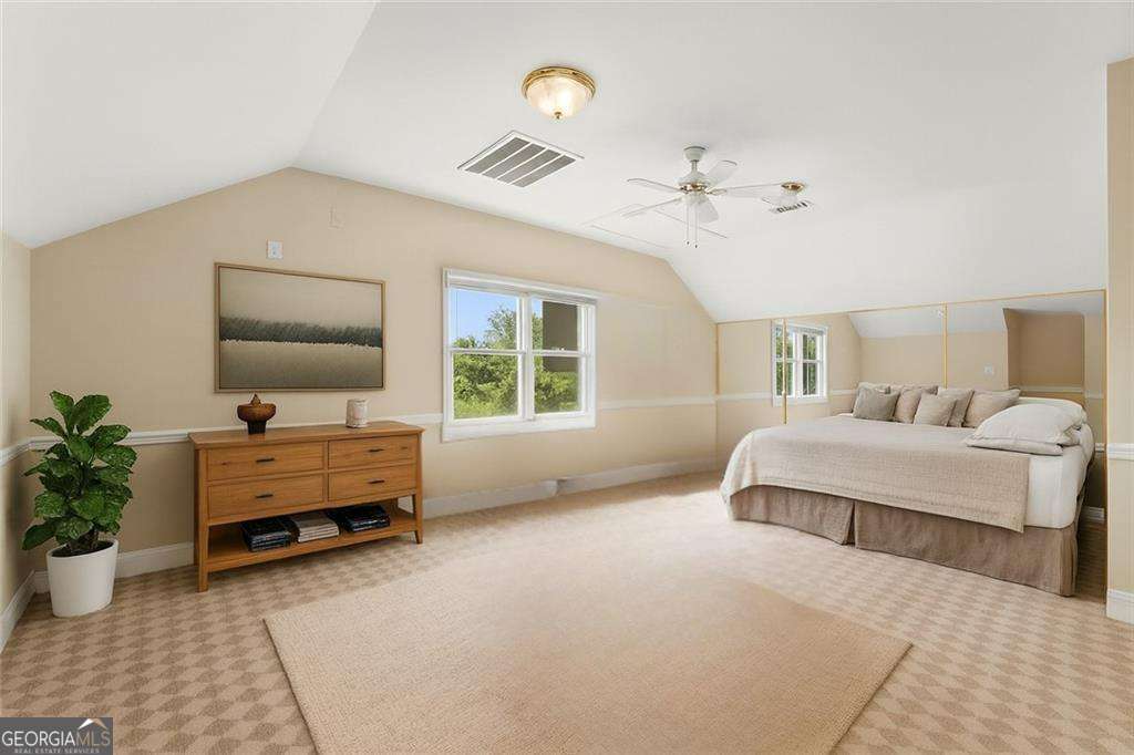 749 Hubert Pittman Road, Unit TRACT 2 Pendergrass, GA 30567 - Photo 50 of 61 a bedroom with furniture and a window