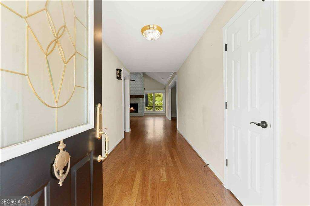 749 Hubert Pittman Road, Unit TRACT 2 Pendergrass, GA 30567 - Photo 5 of 61 a view of a hallway with wooden floor and entryway