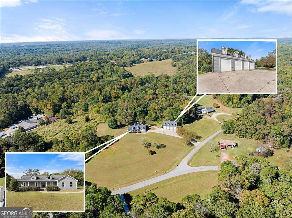 749 Hubert Pittman Road, Unit TRACT 2 Pendergrass, GA 30567 - Photo 57 of 61 an aerial view of a house with a yard and lake view