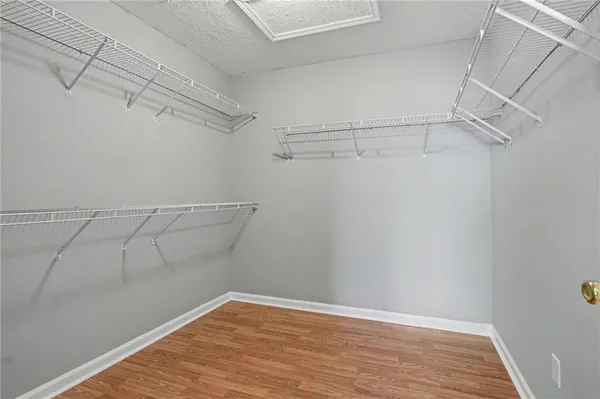a view of a room with racks on the wall
