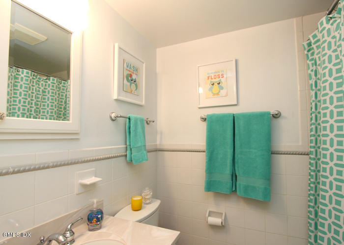 21 Pierce Road Riverside, CT 06878 - Photo 15 of 16 a bathroom with a sink and a mirror