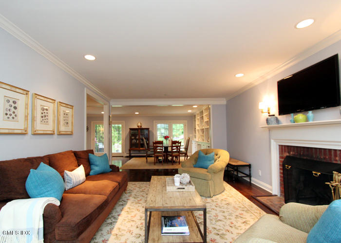 21 Pierce Road Riverside, CT 06878 - Photo 2 of 16 a living room with furniture fireplace and flat screen tv